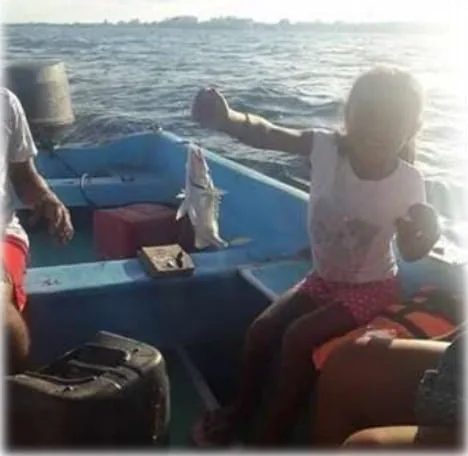 Guests on board during a deep sea fishing tour in Costa Maya