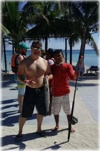 Anglers back on the beach after a morning fishing trip in Mahahual