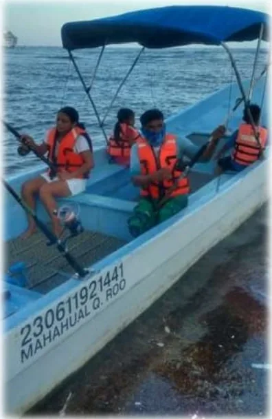 Group heading out on our fishing panga from Mahahual, Quintana Roo